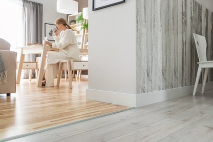 A lifestyle image of the Vox Evera skirting board  EV401 in colour white.