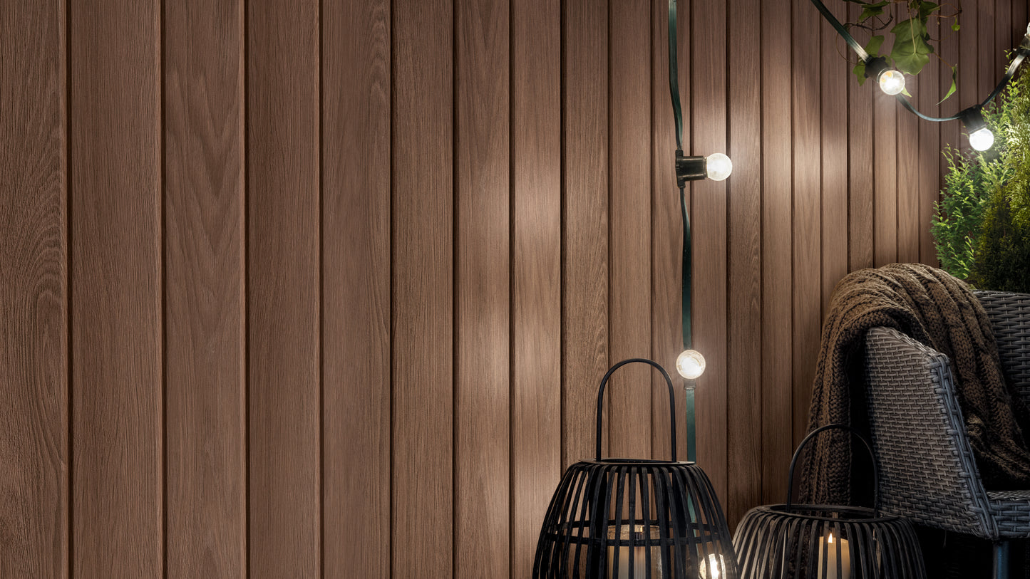 Wooden slat wall with string lights and outdoor furniture